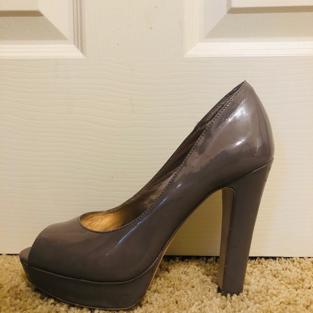 Lightly worn gray sleek heel